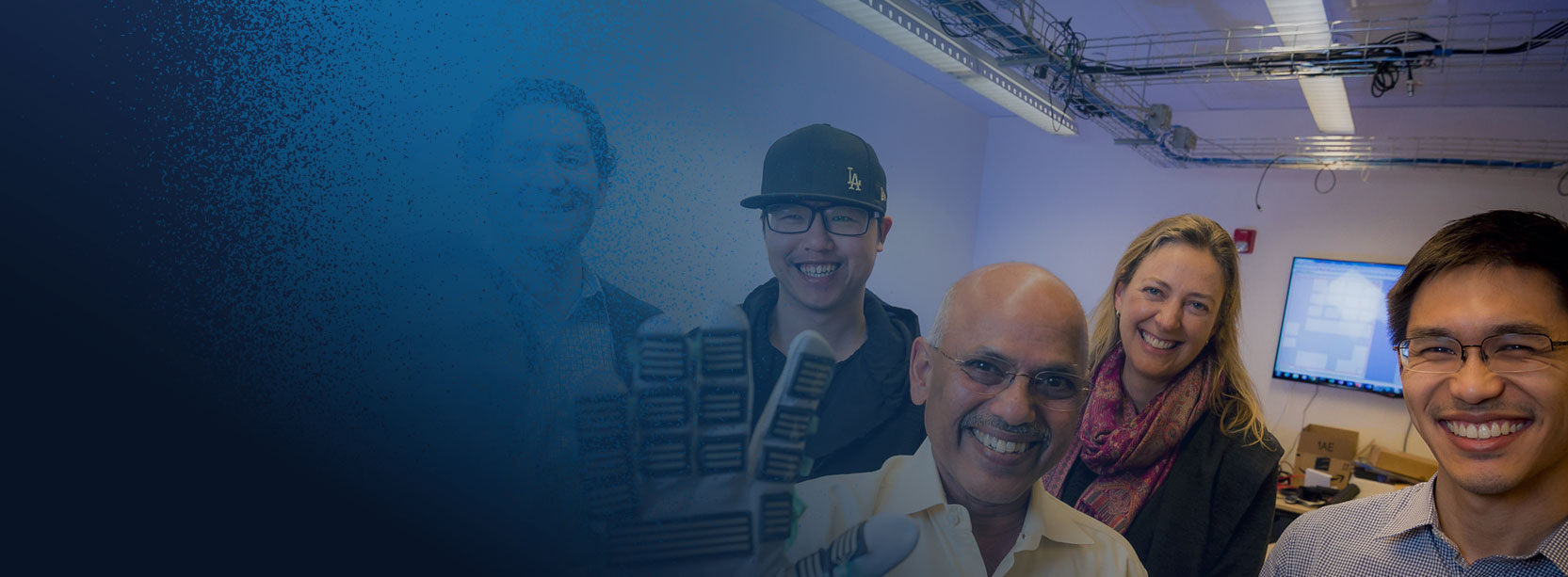 Innovators posing in a lab at UC San Diego